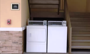 Guest Laundry area with coin operated washer and dryer machines