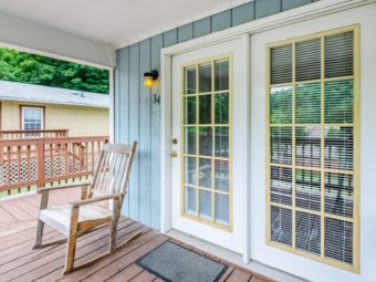 Porch, double doors, and rocking chair