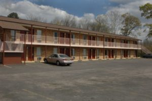 Two story building and parking area