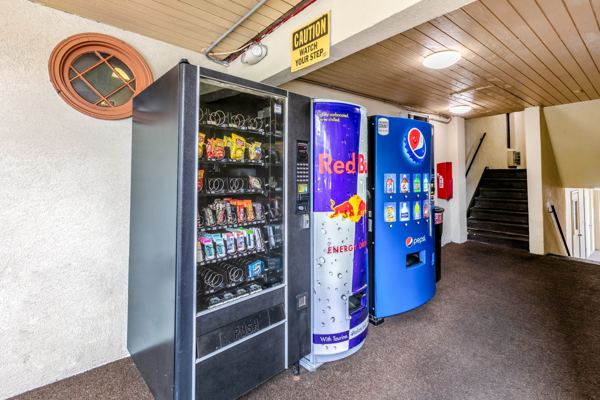 Snack and drink vending machines, carpet flooring