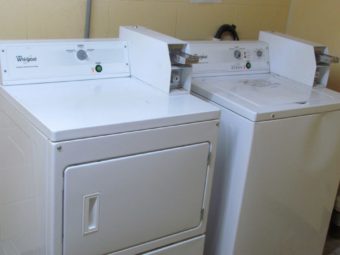 Coin operated dryer and washing machine