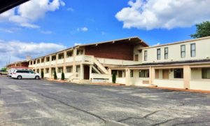 Two story building, parking spaces