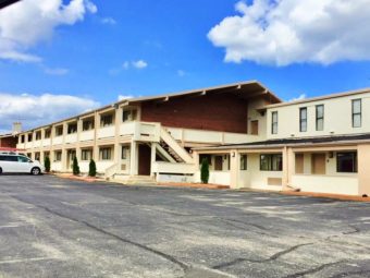 Two story building, parking spaces