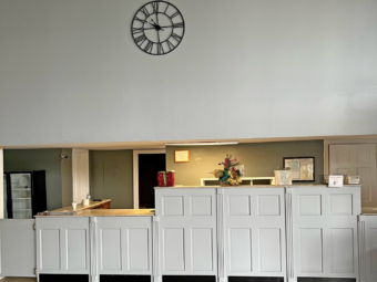 Guest check in desk, tiled flooring