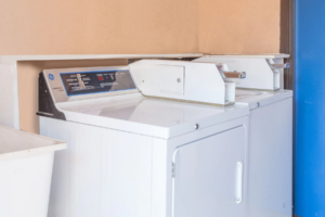 Coin operated washing machine and dryer