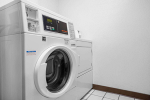 Coin operated washing machine and dryer