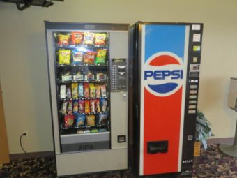 Snacks and drink vending machines, candy dispenser and carpet flooring