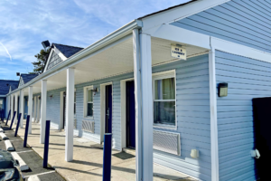 one story building with exterior room entrances and covered walkways