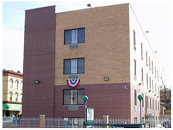 Side view of three story hotel building