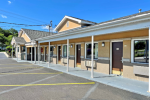 Hotel office, exterior room entrances with covered walkway