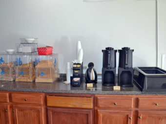 Breakfast display counter with cereal dispensers, coffee pots