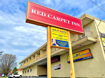 Restaurant Entrance, brand signage. 2 story building