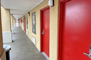 Exterior room entrances with covered walkway