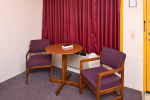 small table and chairs, carpt flooring