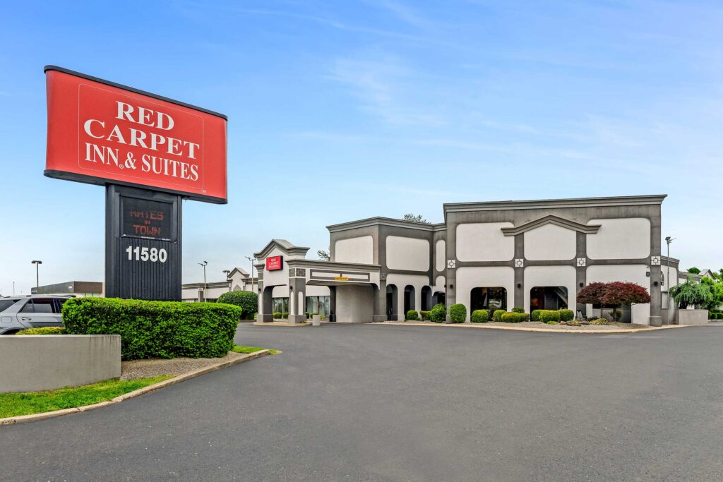 Brand signage, hotel entrance, two story building