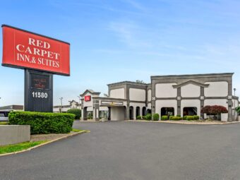 Brand signage, hotel entrance, two story building