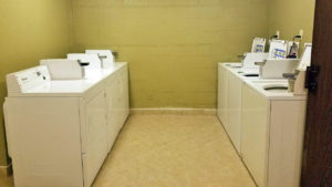 Coin operated washers and dryers, tiled flooring