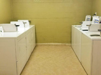 Coin operated washers and dryers, tiled flooring