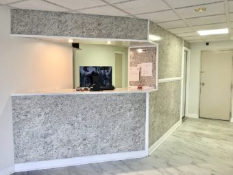 Guest registration desk, tiled flooring