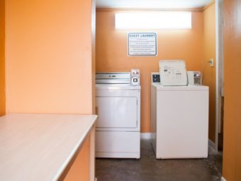 Coin operated washer and dryer, countertop shelf