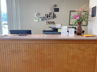 Guest check in desk, vase with flowers
