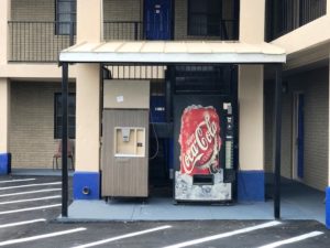 Two story building, vening soft drinks machine, ice dispenser