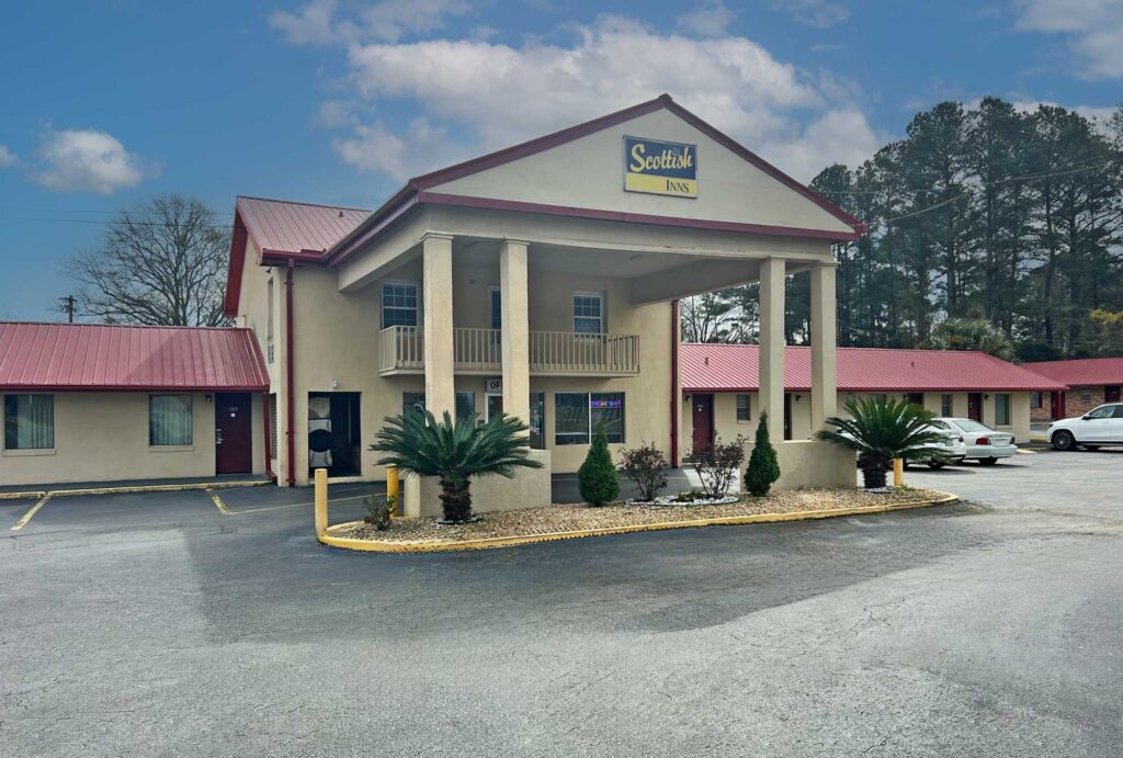 Drive through canopied entrance, one story buildings with exterior guest room