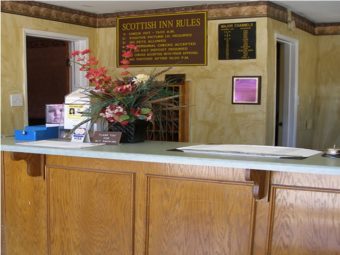 Guest check in desk with guest information and flowers