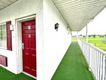 Exterior guest room entrance, covered walkways