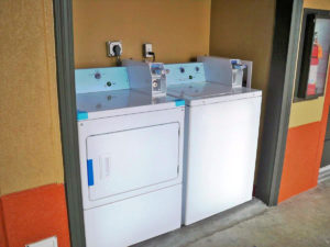 Guest coin operated washer and dryer