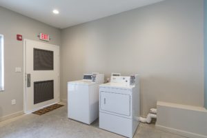 Coin operated washer and dryer