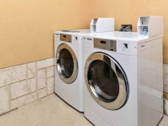 Coin operated washing machine and dryer