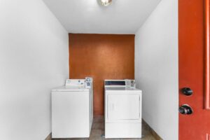 Coin operated washing machine and dryer