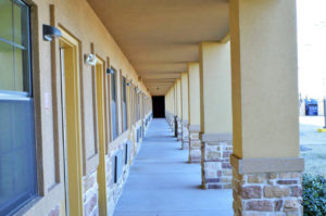 Hotel exterior covered walkway, exterior room entrances