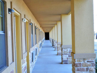 Hotel exterior covered walkway, exterior room entrances