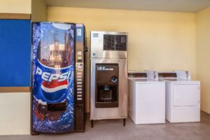 Soda vending machine, ice machine, coin operated guest washing machine and dryer