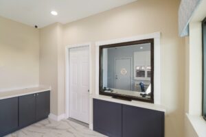 Guest check-in desk, floor cabinets, tiled flooring