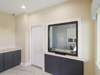 Guest check-in desk, floor cabinets, tiled flooring