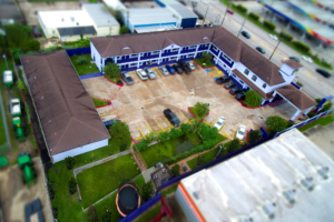 Arial view of hotel buildings, landscaping and parking areas