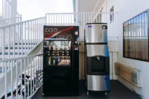 soda vending machine, ice machine, stiars to upper level
