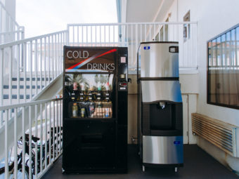 soda vending machine, ice machine, stiars to upper level