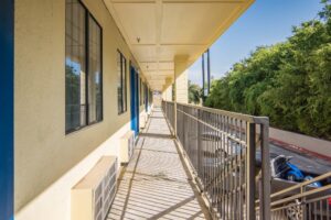 Covered walkways with exterior guest room entrances