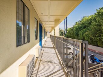 Covered walkways with exterior guest room entrances