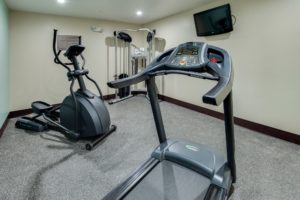 Fitness machines, wall mounted flat screen tv