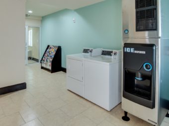 Guest information leaflet stand, coin operated washer and dryer, ice dispenser