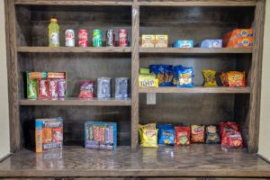 Selection of drinks, snacks and laundry items